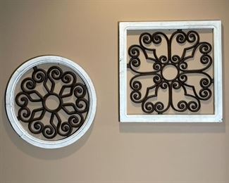 PAIR WALL DÉCOR | Decorative wall hangings, wrought iron swirling patterns within in white rustic painted frames, one circular (dia. 17 in.) the other square (18 x 18 in.) 
