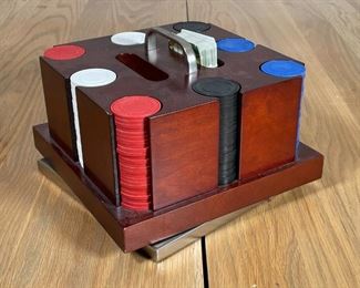 POKER CHIP SET & HOLDER | A set of 200 poker chips in a revolving wood stand on a square metal base with a carrying handle (h. 5-3/4 x w. 8-1/2 x d. 8-1/2 in.); plus a deck of cards [unsure if deck is complete] 