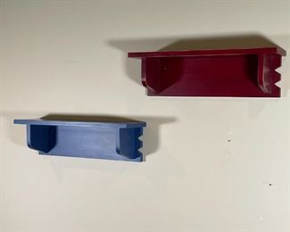 PAIR HANGING WALL SHELVES | Bracket wall shelves, one red, one blue; each h. 7 x w. 24 x d. 7 in. 
