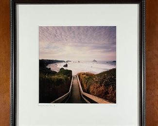 JOHN TODDARO PHOTOGRAPH | "Descending Stairs, Bandon, Oregon", titled and ed. 5/100 lower left, signed lower right with artist's information on verso, a photographic print showing a stairway before a coastal / beach landscape, matted under glass in a nice frame; sight 15-1/2 x 15-1/2 in.; overall 27-1/2 x 27 in. (frame) 
