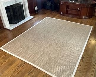 SAFAVIEH WOVEN RUSH CARPET | With a beige canvas border, label to under side; 10 ft. x 7 ft. 10 in. 