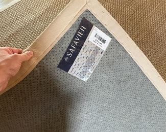 SAFAVIEH WOVEN RUSH CARPET | With a beige canvas border, label to under side; 10 ft. x 7 ft. 10 in. 