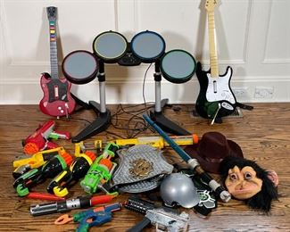 BUCKET O' TOYS | Including 5 nerf guns, 2 light sabers, a monkey mask, plus two Guitar Hero guitar controllers and a playstation drumkit [all untested] 