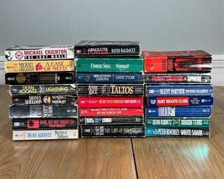 GROUP PAPERBACK BOOKS | Collection of mass market paperbacks with titles by artist's including Dean Koontz, Michael Crichton, Anne Rice, and others 