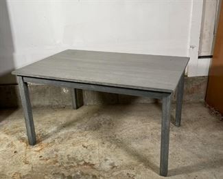 GRAY CHILDREN'S TABLE | Gray painted wood children's table, with some wear but appearing in overall good condition; h. 24-1/4 x w. 45 x d. 30 in. 
