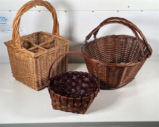 (3pc) MISC. BASKETS | Including a bottle carrying basket (h. 18 x w. 10 x d. 10 in.), a basket with two handles, and an apple basket 