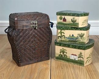 (4pc) COVERED BOXES | Including a woven basket / box with hinged lid and handles (h. 12 x w. 10 x d. 6 in.) and a set of 3 nesting lidded boxes decorated with country town landscape scenes (largest h. 5 x w. 9-3/4 x d. 7 in.) 