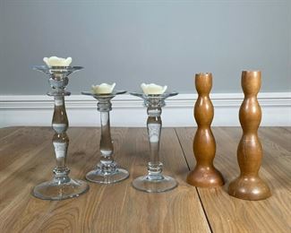 (5pc) CANDLE HOLDERS | Including a pair of Pottery Barn wood candlesticks made in the Philippines (h. 10-1/2 in.) and a suite of glass candlestands, comprising a pair and a third taller candle holder (h. 11-1/4 in.) 