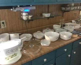 Lots of vintage corning ware dishes and refrigerator boxes