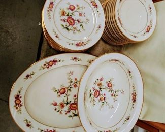 Fine China set, as described on our listing. 