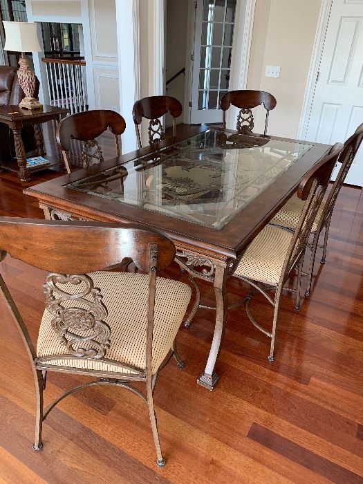 Wrought iron, wood, and glass dining/kitchen table w/6 chairs-detail on chairs are unique