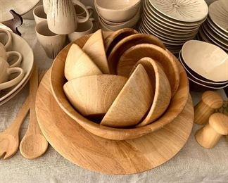 Wooden salad bowls, spoon and fork, and platter