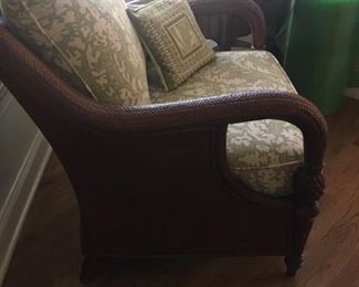 Attractive wicker chair with cushions