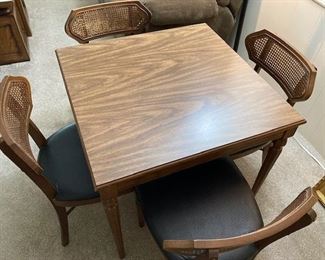 Mid-Century Game Table w/ 4 Wicker Back Chairs.