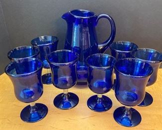 9 Piece Blue Glass Pitcher and Goblet Set.