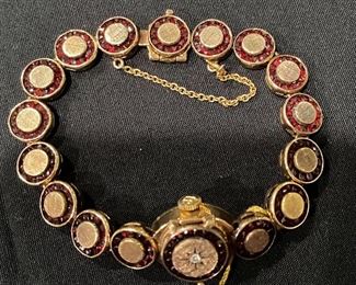 14K Yellow Gold, Diamond & Pyrope Garnet Lucien Piccard Watch. 