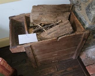 Old dough tray or dry sink used as wood box