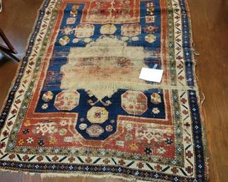 antique Persian rug, needs work
