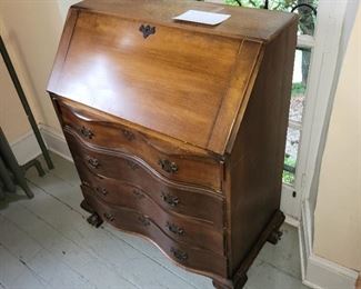 Slant front serpentine front desk, 20th century