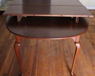 39 - Queen Anne mahogany dining table w/ 2 leaves 30 x 64 x 40 1/2
