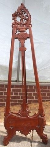 61 - Carved mahogany easel stand - as is no adjustable surface
