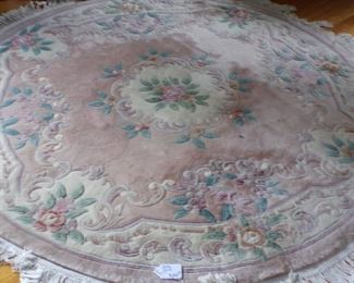 60" round wool rug.