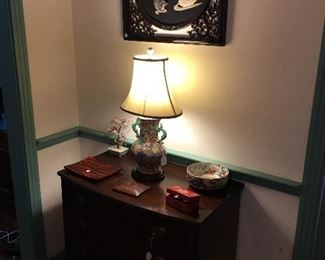 Chest, oriental lamp, jade picture