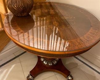 Neoclassical round table with glass top