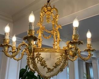 1910 Dining room chandelier from France Neoclassic french empire ornate gilded bronze and glass chandelier. Appraised at $10,000 in 2008. 34 inches wide. place of  origin: France.