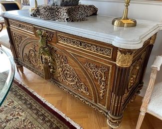 An Amazing piece Marie Antoinette Salon  piece 3 draws over 2 doors base gilt metal dials on front and sides of nudes and putti figurines and lion head Escutcheon cabinet  71 inches x 26 deep and 37 inches high. Model by Joseph Stockel & Guilaume Bemmeman. 