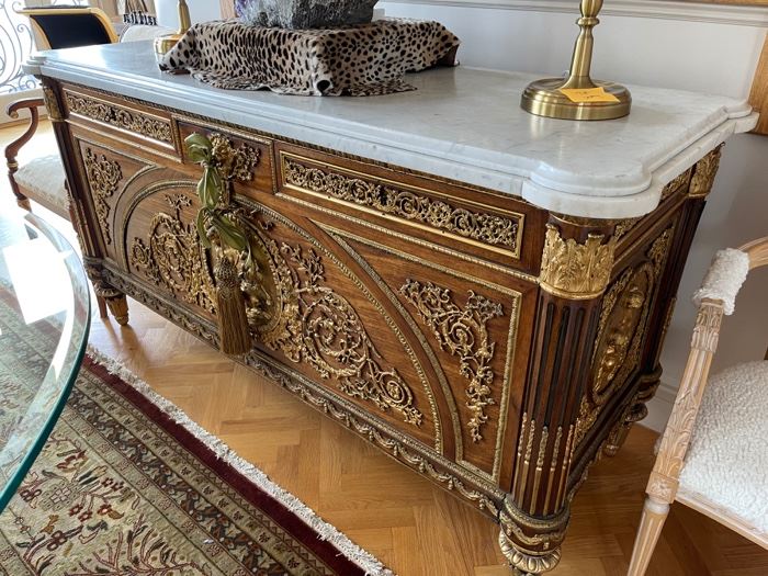 An Amazing piece Marie Antoinette Salon  piece 3 draws over 2 doors base gilt metal dials on front and sides of nudes and putti figurines and lion head Escutcheon cabinet  71 inches x 26 deep and 37 inches high. Model by Joseph Stockel & Guilaume Bemmeman. 