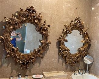 two ornate mirrors