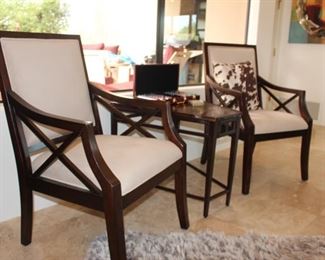 Two captain chairs, hammered metal accent table