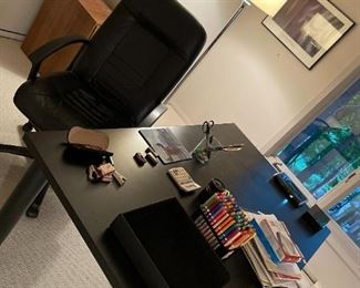 office desk and large desk chair