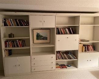 wall unit bookcases/pull down desk space with great 70s chrome rounded square knobs