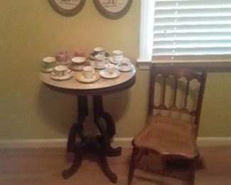 Cup and Saucer Collection Marble Top round Table  Cane Bottom child's Chair