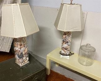 Pair of glass base lamps filled with seashells