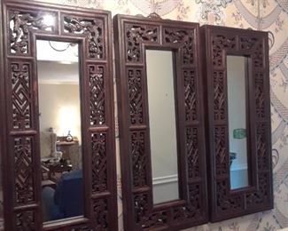 Three carved hall mirrors