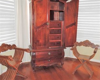 Gentleman's Chest.  Carved corner chairs