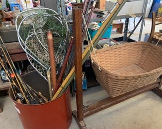 Fishing poles and baby cradle basket