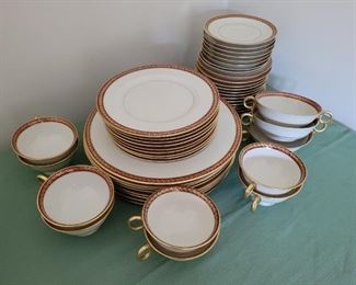 $200  Theodore Haviland "Lauria" Red, 8 tea cups/saucers, 13 dessert plates, 3 bouillion bowls, 8 dinner plates, 9 salad plates