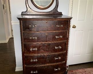 Vintage highboy dresser with original pulls and casters  $400