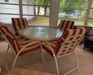 patio table and 4 chairs with umbrella and base