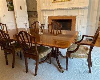 Baker Furniture Double Pedestal Table with Inlaid Wood and Brass Claw feet with castors