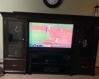. . . a nice large flat-screen TV in beautiful cabinet