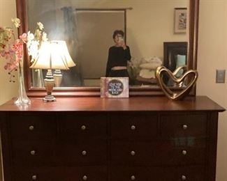 . . . love this mirrored dresser featuring lots of storage