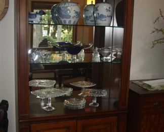 LIGHTED CURIO CABINET WITH STORAGE