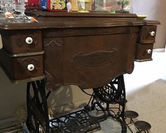 Vintage Treadle Sewing Machine with  cabinet.  
