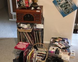 Record player combo, albums and records. Portable 8-track player and some Tapes.