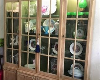 China cabinet by Baker, lighted. 64.75"W x 12.5"D x 86.25"H.